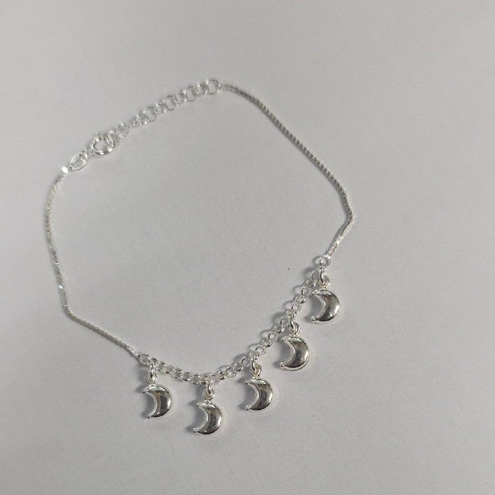 Silver Charm Bracelet with Polished Finish